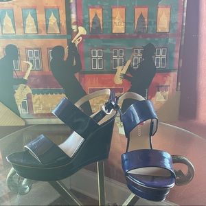 Purple patent leather wedges